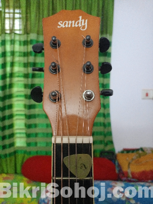 Sandy acoustic guiter